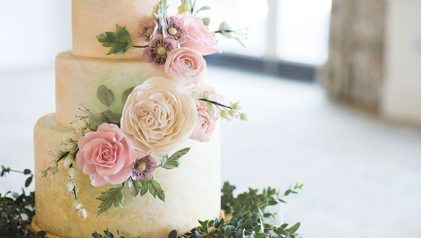 Wedding cake adorned with flowers